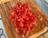 Une image de l'étape 8 de Courgettes et poivrons farcis bœuf, tomates et oignon.