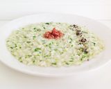Foto del passaggio 6 della ricetta Risotto con crema di gorgonzola, zucchine e speck croccante
