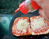 A picture of step 4 of Cheese bread pizza 🍕.