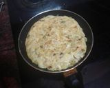 Foto del paso 5 de la receta Tortilla de papas con cebolla, calabacín y perejil