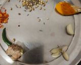 A picture of step 1 of Gobhi aloo matar.