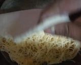 A picture of step 7 of Dominoes style garlic bread.