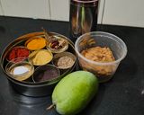 A picture of step 1 of Raw mango vaghariyu.