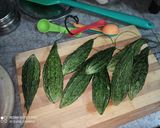 A picture of step 1 of Punjabi Karele Ki Sabzi.