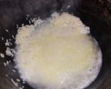 Foto del paso 3 de la receta: Arroz blanco salteado en mantequilla al ajillo