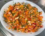 A picture of step 16 of Colorful Salad with White Rice, Carrots, Peas, Tomato, Radishes, and Cilantro.
