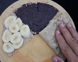 A picture of step 2 of Banana and Nutella tortilla wrap.