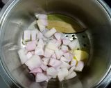 A picture of step 1 of Pumpkin and Carrot Soup.