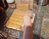 Foto del paso 4 de la receta: Postre de Vainillas con chocolate, crema y frutas