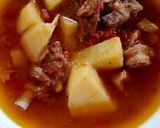 A picture of step 4 of Aloo gosht.