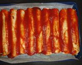 A picture of step 10 of XXXX Hot Beef Enchiladas.
