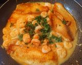 Foto del paso 3 de la receta: Filete de Tilapia con camarones🍤 al ajillo🧄