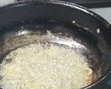 A picture of step 1 of Matar pulao.
