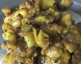 A picture of step 3 of Aloo Wali stuff mirchi.