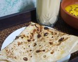A picture of step 3 of Mango chutney with daal bhari roti and mango lassi.