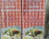 Foto del paso 1 de la receta: Pollo al horno sobre leche evaporada, boniato, cebolla y padrones