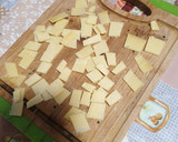 Foto del paso 3 de la receta: Champiñones a la plancha con jamón serrano y queso holandés