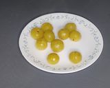 A picture of step 2 of Amla Ki Launji (amla and jaggery).
