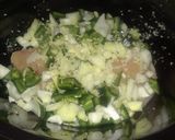 A picture of step 2 of Easy Crockpot Chicken Enchilada Casserole.