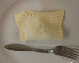 A picture of step 8 of Cheeseburger Turnovers.