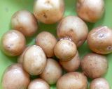 A picture of step 1 of Crispy cheese potato (baby potato with cornflour).