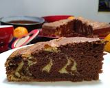 Foto del paso 8 de la receta Bizcocho cebra borracho de naranja y chocolate