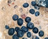 A picture of step 1 of Banana pancakes with pecan nuts and fresh blueberries.