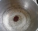 A picture of step 2 of Coconut rice.