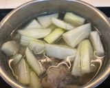 Hình bước làm 5 của món Canh Đu Đủ Xanh Hầm Giò Heo