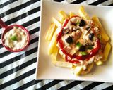 A picture of step 7 of Cheesy Fries.