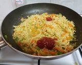 A picture of step 6 of Maggi stuffed jacket potatoes.