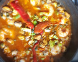 Foto del paso 9 de la receta: Arroz con sabor y algún marisco..