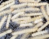 A picture of step 4 of Peri peri fries.