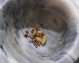 A picture of step 5 of Gajar ka halwa with peels.