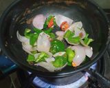 A picture of step 2 of Kungpao chicken with fried rice.