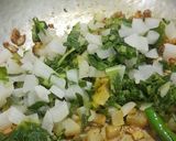 A picture of step 6 of Muli bhurji.