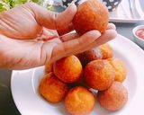 A picture of step 5 of Corn cheese stuffed flattened rice balls.