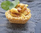 A picture of step 8 of Rajgira jaggery tart with caramelized apple and nuts.