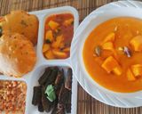 A picture of step 2 of Aam Rass - Methi Masala Puri Rasewale Aloo Sabji, Stuffed Bhindi Masala, Fries and Pickle 😋.