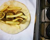 A picture of step 4 of Falafel sandwich||Falafel wrap.