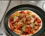 A picture of step 16 of Pepper Chicken Pizza.