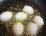 A picture of step 6 of Tamil style fried eggs.