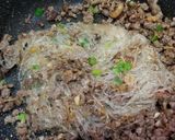 A picture of step 2 of Chinese XO Sauce Minced Pork with vermicelli glass noodles.