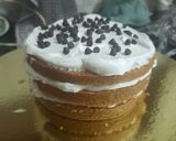 A picture of step 8 of White Forest Football cake.