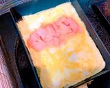 A picture of step 5 of Dashi Mentaiko Tamagoyaki (Japanese Rolled Omelette with Spicy Cod Roe).