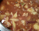 Foto del paso 2 de la receta: Patatas guisadas con patas y aletas de chipirones