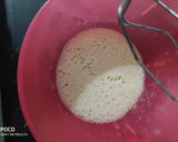 A picture of step 5 of Fruity Coconut Crumble Squares.