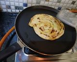 A picture of step 4 of Lachha paratha.