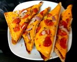 A picture of step 2 of My Late night Cheese, Onion and Tomatoes Melted on toast🤩.