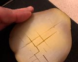 A picture of step 2 of Cheesy Oven Potatoes.